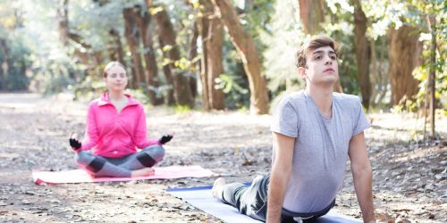 young-couple-warming-stretching-park_23-2147562280 young-couple-warming-stretching-park_23-2147562280